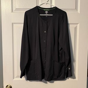 Gray Healing Hands scrub jacket.